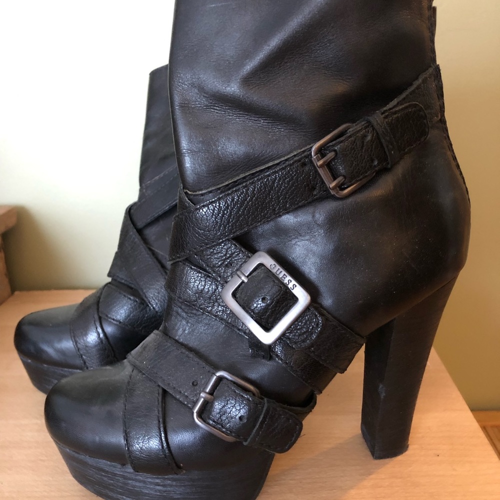Guess black leather booties with buckle.